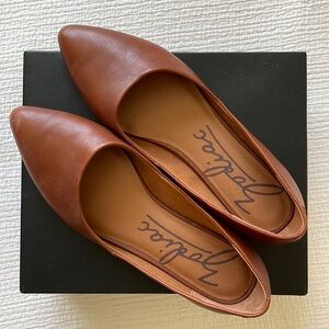 Light brown leather flats, size 8